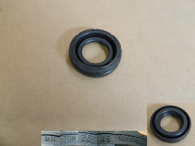 photo for 1003314-E10 - OIL SEAL ASSY SPARK PLUG