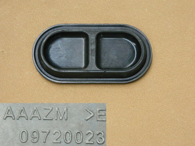 photo for 09720023 - RUB PLUG-FR/RR FLOOR RR WHEEL COVER